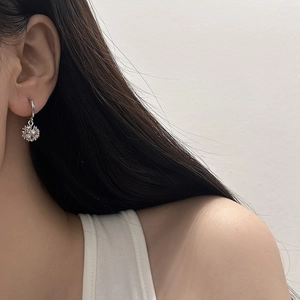 Elegant silver snowflake drop earrings featuring sparkling cubic zirconia for women