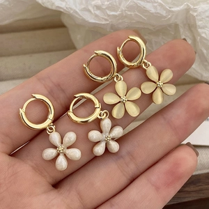 Elegant floral earrings with cat eye stone and pearl finish pendants on gold hoops