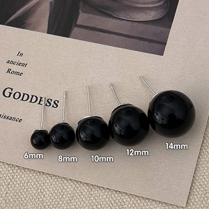 Comparison of black pearl stud earrings in five sizes from 6mm to 14mm diameter