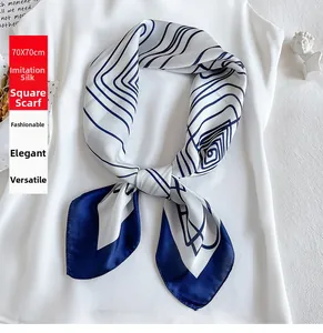 Detail of 70x70cm faux silk square scarf with blue and white geometric stripes on top