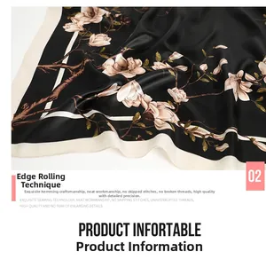 Détail de la finition d'ourlet roulé sur un foulard carré soyeux à fleurs