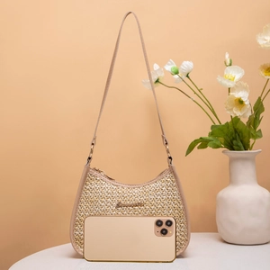 Beige straw woven underarm bag with gold metal logo and leather trim for summer