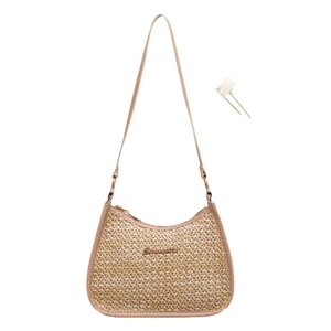 Beige straw woven underarm shoulder bag with leather trim and metal logo decoration