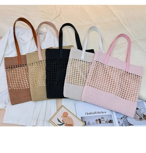 Detailed view of handmade woven tote bags in five colors with mesh hollow-out design