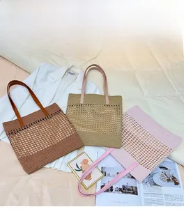 Detailed trio of woven tote bags in brown, beige and pink with mesh texture