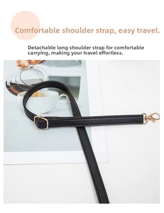 Adjustable black leather strap with gold metal lobster clasp and buckle detail