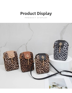 Multiple colors of leopard print crossbody bags with tassel and crown metal charm
