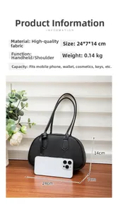 Detail view of lychee pattern handbag showing dimensions 24x7x14cm and lightweight design