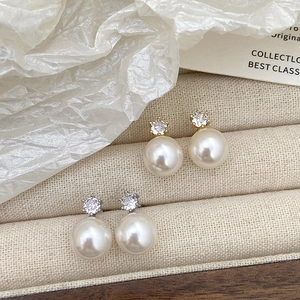 Classic white pearl stud earrings with zircon accents in gold and silver settings