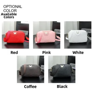 Detailed view of quilted crossbody bags in red, pink, white, brown and black colors