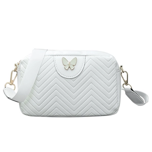 White crossbody bag with V-stitch pattern and butterfly logo on a wide strap