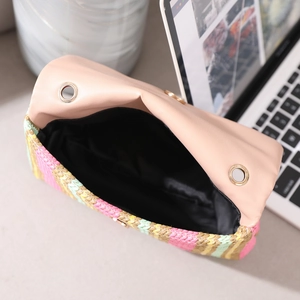Fashion rainbow woven crossbody bag with pink leather flap and metallic eyelet details