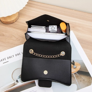 Retro black crocodile embossed handbag with gold chain detail and open interior space