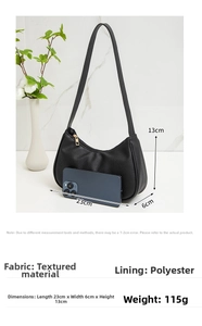 Litchi pattern underarm bag size comparison with a phone, measuring 23x6x13cm and 115g weight