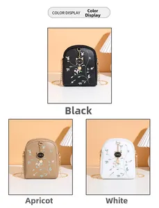 Comparaison détaillée des sacs à bandoulière brodés fleurs en noir, abricot et blanc