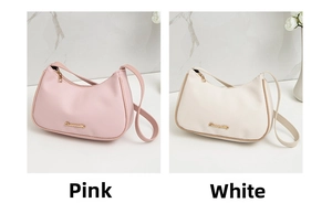 Detail view of pink and white lychee texture hobo bags with metallic Sunmighty logo
