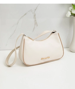 Detail of lychee pattern beige hobo bag with gold metal logo and khaki edge detailing
