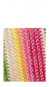 Detailed close-up showing the colorful raffia woven texture of the handmade mini tote bag