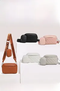 Quilted crossbody camera bags in five colors with matching detachable round coin purses