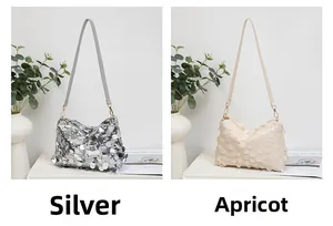 Détails des sacs à bandoulière à paillettes argentées et abricot scintillants