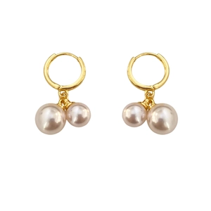 Korean style gold hoop earrings with double pearl pendants on a clean white background