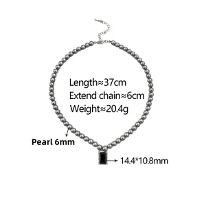 Detailed view of 6mm grey pearl necklace with black gemstone pendant and size dimensions