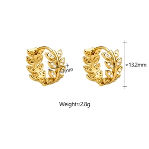 Detailed view of gold leaf earrings with zircon pavé showing 13.2mm diameter size