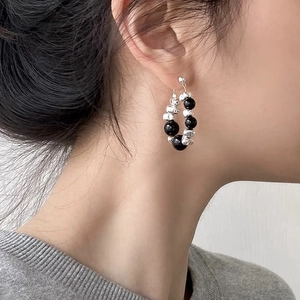 Minimalist beaded hoop earrings with black stones and textured irregular silver beads
