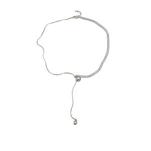 Long Y-shaped silver necklace with zircon chain, pearl pendant and tassel design