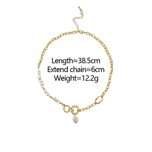 Close-up of asymmetric freshwater pearl necklace with interlocking rings and 6cm extension