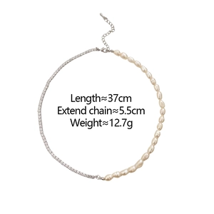 Detailed view of baroque pearl and zircon splice necklace with 37cm length and 5.5cm chain