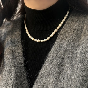 Baroque freshwater pearl and metal chain necklace with asymmetrical French vintage design