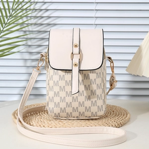 Chic beige monogram crossbody phone bag with gold hardware on a stylish woven mat