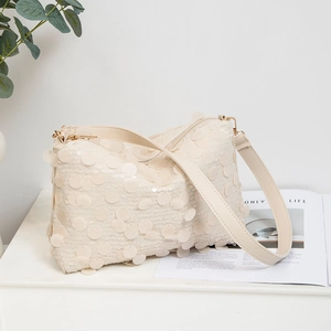 Sac sous le bras tendance à paillettes blanc crème avec fermeture éclair dorée