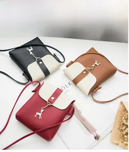 Chic mini phone crossbody bags in black, caramel and burgundy with deer metal charm