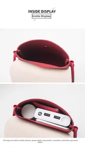 Detail view of the red crossbody phone bag interior showing storage space for mobile items