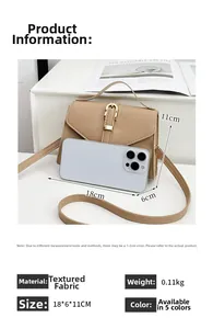 Detail view of khaki crossbody bag with 18x6x11cm dimensions and metal buckle