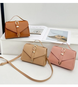 Three PU leather square bags in brown, beige, and pink colors with V-shaped flaps