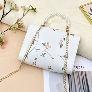 Floral embroidery white leather handbag with pearl handle and gold chain strap