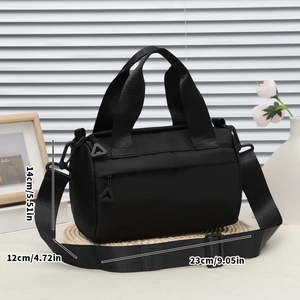 Minimalistische schwarze Zylinder Umhängetasche aus Nylon, Maße 23x14x12cm