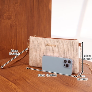 Chic woven beige square crossbody bag with brown wrist strap and gold chain strap