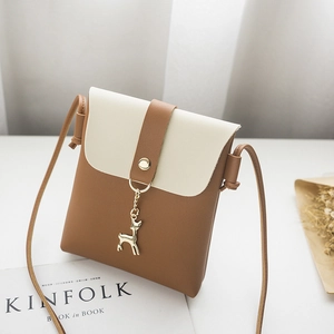 Vertical contrast phone crossbody bag with gold deer pendant and magnetic flap closure