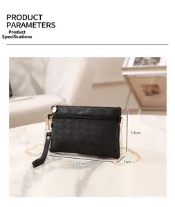Detail showing dimensions of black woven leather handbag with gold chain strap