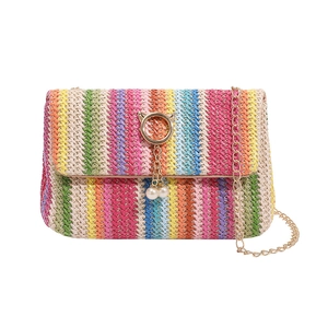 Colorful striped woven crossbody bag with gold chain strap and pearl charms