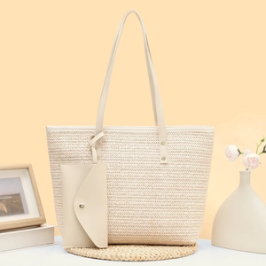 Chic beige woven tote bag with matching envelope pouch and slim leather straps for women