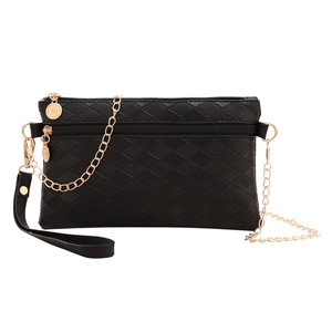 Chic black rhombus quilted crossbody bag with dual zippers and gold chain strap