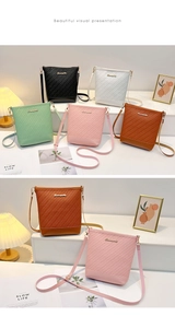Detail view of multicolored bucket bags featuring embossed woven textures and gold logo