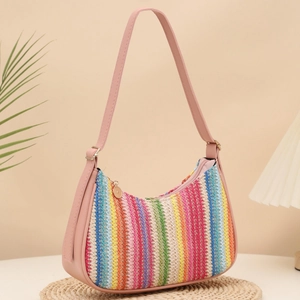 Rainbow striped woven hobo bag with pink leather strap and crescent shape design
