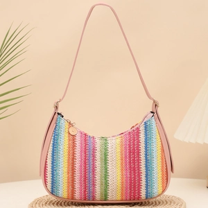 Colorful striped straw crescent underarm bag with pink strap and golden zipper detail