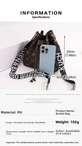Brown monogram bucket bag with letter printed wide shoulder strap and dimensions 18x9x19cm